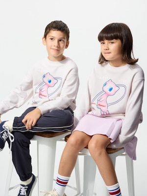 long sleeved white sweatshirt with a large mew illustration on the front.