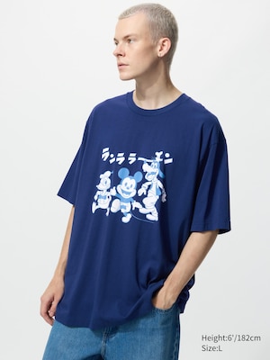 blue t-shirt with donald duck, mickey mouse and goofy on the front with japanese text.