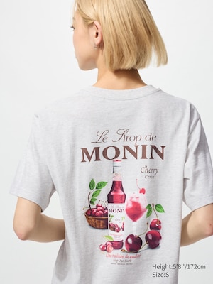 white t-shirt with strawberry sirup picture on the back and le sirop de monin title.