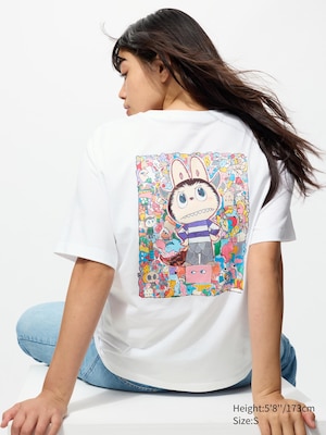 White t-shirt with a large colorful labubu graphic on the back and the monsterland text on the front.